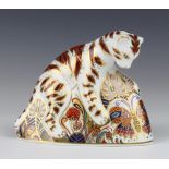 A Royal Crown Derby Imari pattern paperweight in the form of a bengal tiger cub with silver