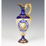 A Coalport ewer decorated with a mountainous Scottish Landscape the blue ground with gilt decoration