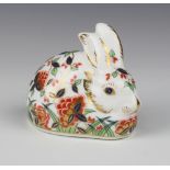 A Royal Crown Derby Imari pattern paperweight - Meadow Rabbit with gold stopper 9cm