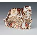 A Royal Crown Derby Imari pattern paperweight in the form of a Bengal tiger with silver stopper,