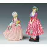 Two Royal Doulton figures Priscilla HN1340 20cm and Honey HNB1909 17cm Honey has chipped roses and