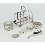 An Edwardian silver 5 bar toast rack on ball feet Birmingham 1906 and other minor silver items,