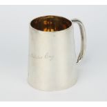 A silver tapered mug with inscription, London, 166 grams, 9cm The marks are rubbed