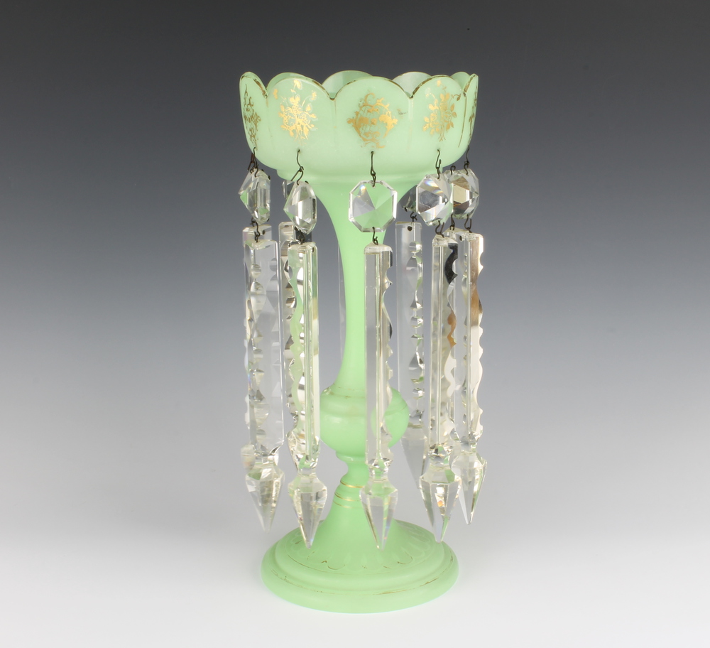 A Victorian green lustre with clear faceted drops 30cm Some of the lustres are damaged