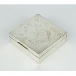 A square silver cigarette box with engraved signatures and crest Birmingham 1933, 9cm