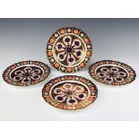 Four Royal Crown Derby Imari pattern plates 23cm