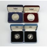 Two silver proof one pound coins and 2 silver New Zealand crowns 75 grams