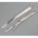 Two American Art Nouveau white metal fruit knives, one knife with steel blade and seed pick, the