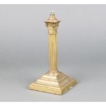 A brass reeded column table lamp with Corinthian capital raised on a stepped base 18cm x 9cm x 9.5cm