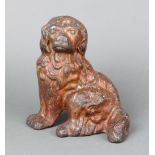 Kenrick, a Victorian cast iron door stop in the form of a seated Spaniel 19cm x 20cm x 8cm