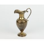 An Edwardian urn shaped silver cream jug with S scroll handle, London 1907, 104 grams There are