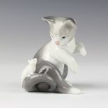 A Lladro figure of a kitten with a mouse on his tail 8cm