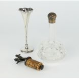 A tapered silver posy vase 13cm with rubbed marks, a mounted bottle and a bottle stopper