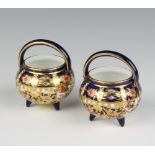 A pair of Royal Crown Derby Imari pattern cauldrons 6cm