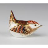 A Royal Crown Derby Imari pattern paperweight in the form of a Derby ram with silver stopper 7cm,