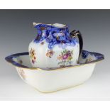 An Edwardian Doulton Burslem wash jug and rectangular bowl The jug is cracked