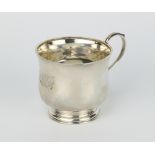 A silver baluster mug with C scroll handle Birmingham 1938, maker Hewkin & Heath, 132 grams
