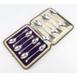 A set of 6 Edwardian silver teaspoons Sheffield 1907, cased and 6 fiddle pattern silver teaspoons