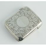 A Victorian silver vesta with chased decoration and vacant cartouche, Birmingham 1897, 48 grams