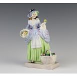 A Royal Doulton figure - Spring Flowers HN1807 18.5cm