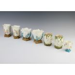 Three pairs of Moore porcelain floral vases 10cm, 11cm and 12cm, a single do. 7cm All have minor