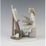 A Lladro figure of an artist sitting at her easel 5360 17cm Her paintbrush is stuck to her hand