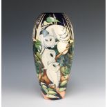 A modern Moorcroft limited edition oviform vase decorated with owls no.53/100, dated 2010 37cm,