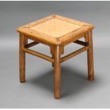 A square Chinese light padauk occasional table with rattan inset to the centre 47cm h x 43cm w x