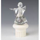 A Swarovski Crystal Angel by Adi Stocker 194761/74750006000 1995 9cm boxed