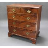 A Georgian mahogany chest of 2 short and 3 long drawers with brass swan neck drop handles, raised on