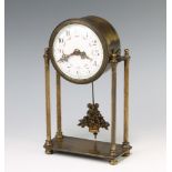 An Edwardian French Empire style Portico clock with enamelled dial Arabic numerals contained in a