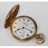 A gentleman's gold plated hunter pocket watch Ever Rite with seconds at 6 o'clock This watch is