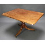 A Regency rectangular mahogany breakfast table raised on a turned gun barrel and tripod base