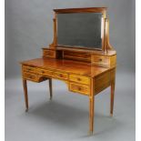 Gillows, a Victorian inlaid mahogany dressing table with raised mirrored back, the base fitted 2