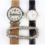 A gentleman's gilt cased Raymond Weil calendar wristwatch, a Timberland watch and a Links silver