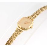 A lady's 9ct yellow gold Omega wristwatch on a do. bracelet, gross weight 17.6 grams