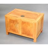 A rectangular Chinese light padauk coffer with hinged lid 55cm h x 85cm w x 55cm d A hole has been