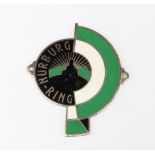 Of motoring interest, a vintage Nurburg-Ring enamelled radiator badge, the reverse marked GES.GESCH