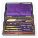 A 19th Century bone, brass and steel part geometry set contained in a rosewood case with hinged lid