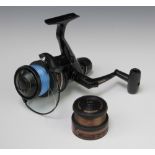 A Daiwa PG2050 long cast multiply fishing reel together with spare spool