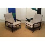 A PAIR OF TEAK UPHOLSTERED OPEN ARMCHAIR