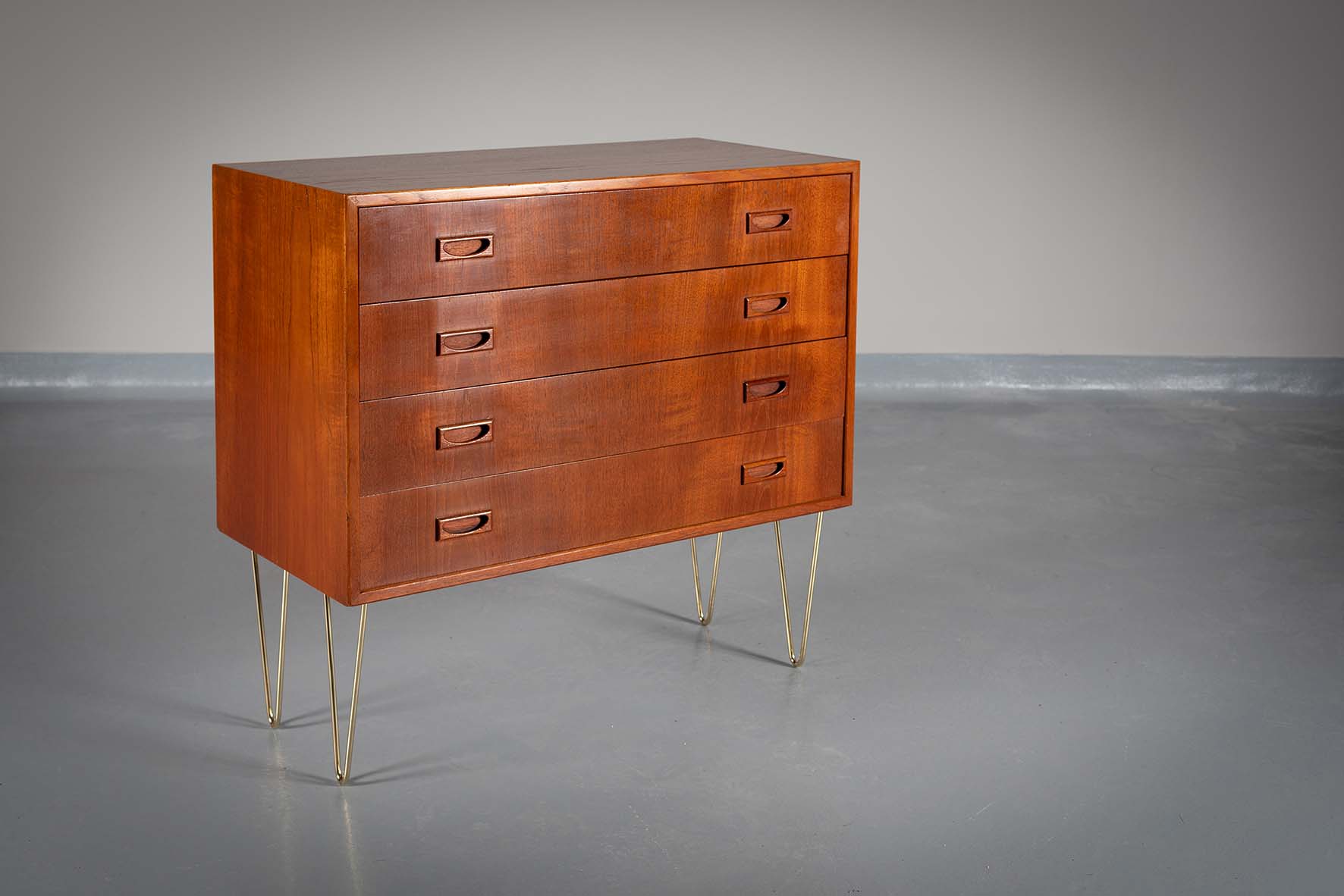 A TEAK CHEST OF FOUR DRAWERS, DANISH, on