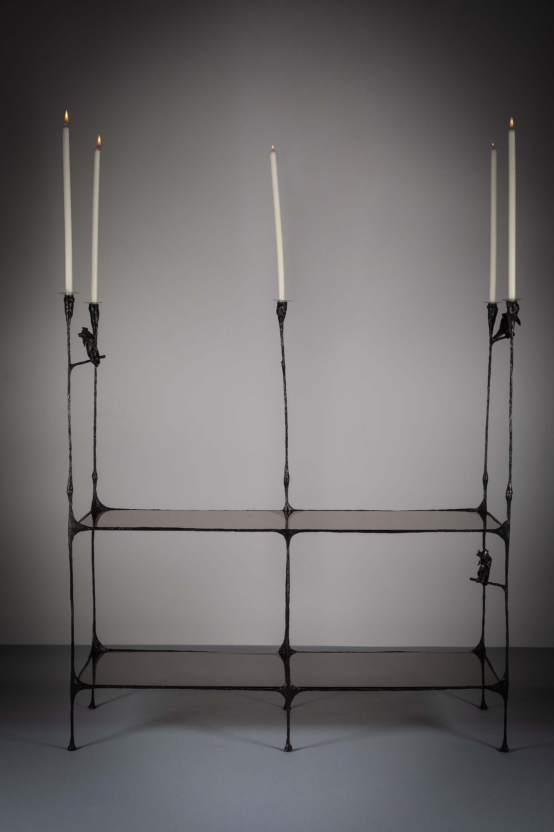 A BRONZE SET OF OPEN TWO TIER GLASS SHEL