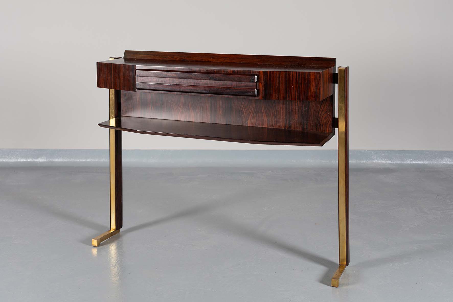 A ROSEWOOD AND GILT METAL INLAID CONSOLE