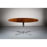 A ROSEWOOD OVAL DINING TABLE, DANISH, 1970s, on a metal star base, 160cm (w) x 120 (d) x 74 cm (h)