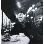 John Minihan SAMUEL BECKETT PHOTOGRAPHED IN CAFE  FRANCAIS, BOULEVARD St. JACQUES, PARIS ,