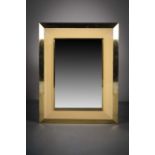 A GILT UPRIGHT WALL MIRROR, 1970s, French, by Jean Claude Mahay, 81cm x 70cm, bearing label,