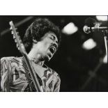 John Minihan JIMI HENDRIX, ISLE OF WHITE FESTIVAL 1971 Photograph, 13" x 18" (33 x 46cm) signed,