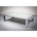 A POLISHED CHROME RECTANGULAR COFFEE TABLE, FRENCH 1970s, with inset mirrored top, on block feet,