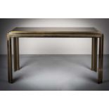 A CHROME AND GILT CONSOLE TABLE, ITALIAN 1970s, with inset mirrored top, on stepped frame, 146cm (w)